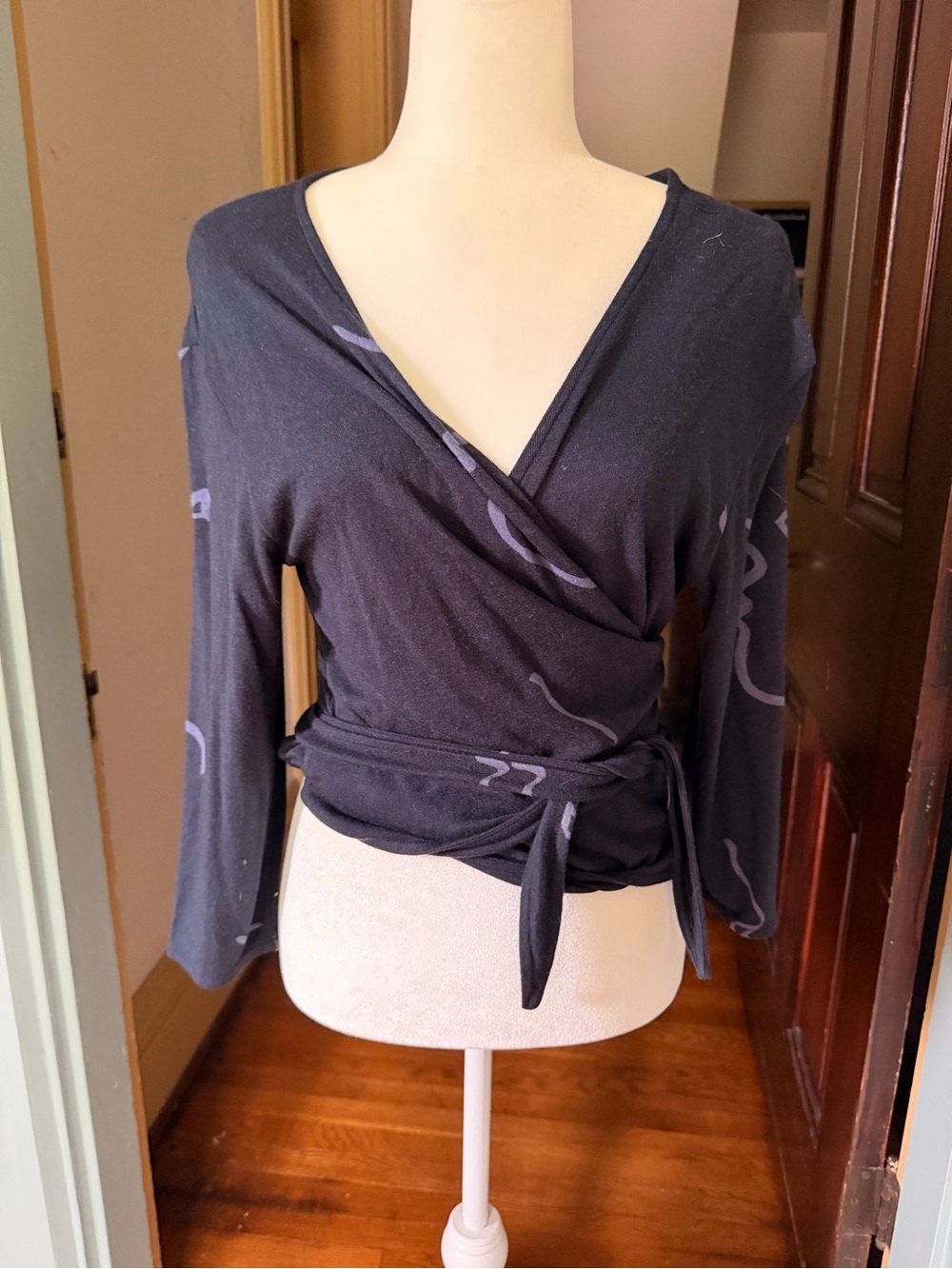 Paloma Wool Navy Wrap-Front Long Sleeve Top with Subtle Print